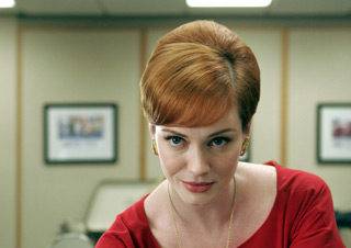 Christina Hendricks as Joan Holloway on AMC's Mad Men