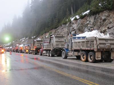Trucks bringing snow to Cypress Mountain in B.C. for the 2010 Winter Olympics. 