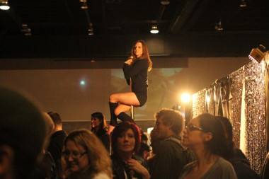 Girl on a pole Pole dancer at the Taboo Naughty But Nice Show at the Vancouver Convention Centre, Jan 15 2010