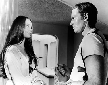 Leigh Taylor-Young and Charlton Heston in Soylent Green (1973).