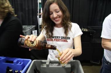 Girl pouring beer at VCBW 2011 photo